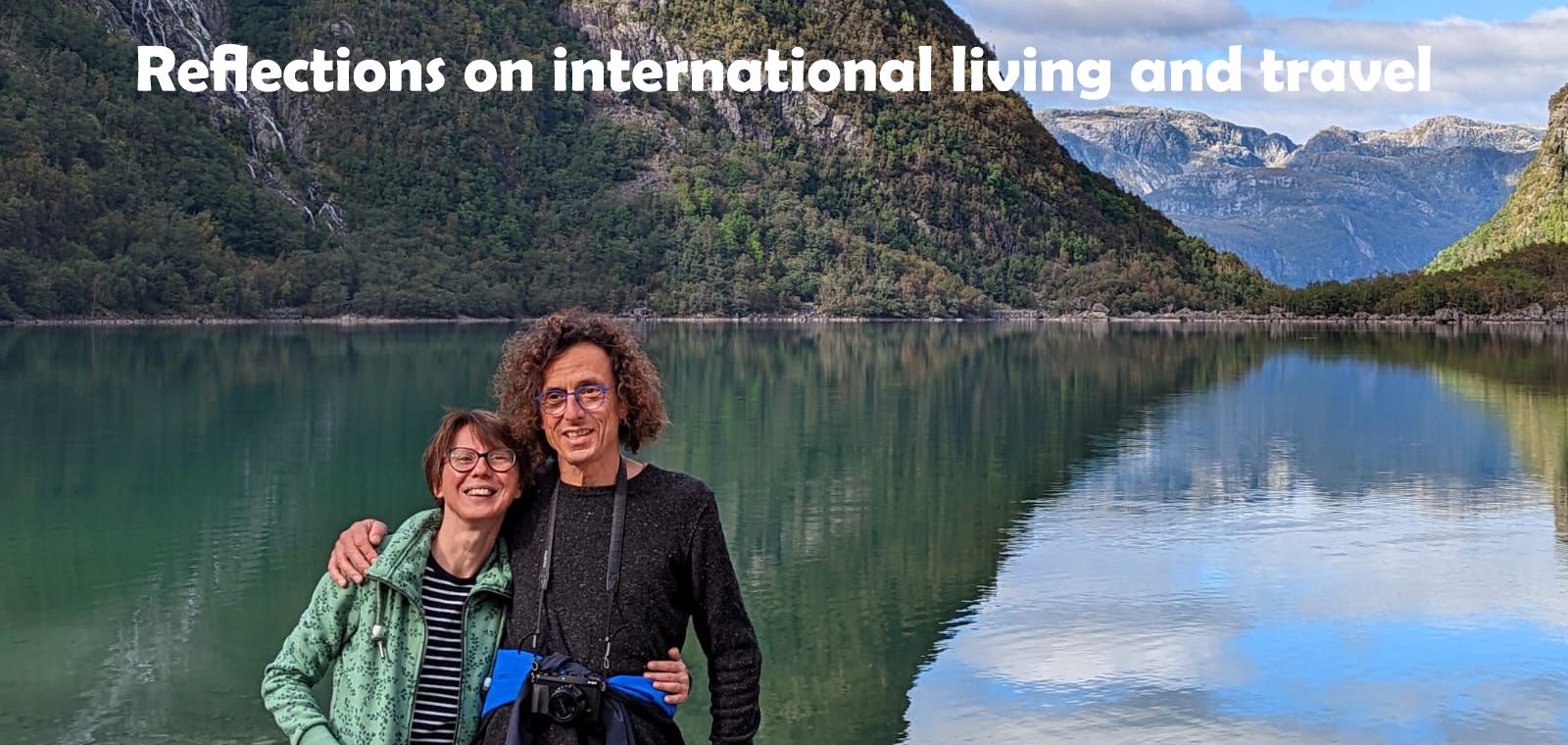 Ira and Jeffrey in front of a mountain lake somewhere in Norway