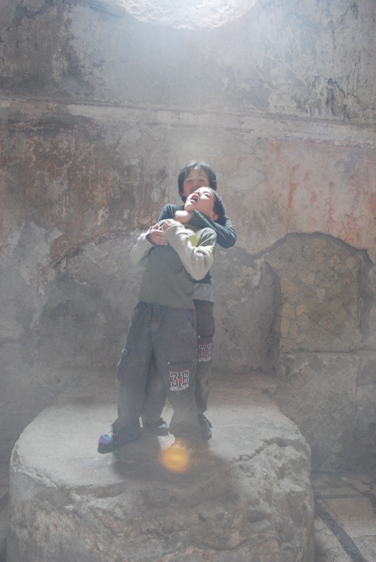 My sons act out a drama in dramatic Pompeii - or maybe Herculaneum