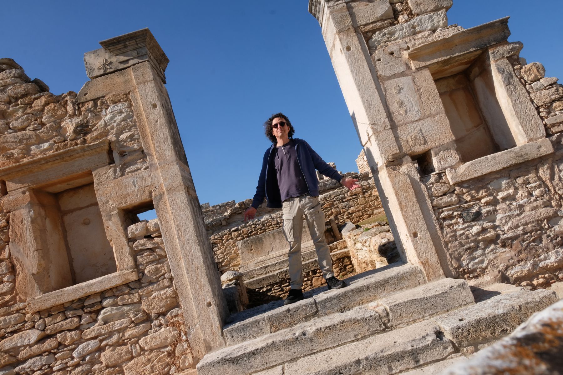 Jeffrey standing in doorway in ruins at Palaipafos