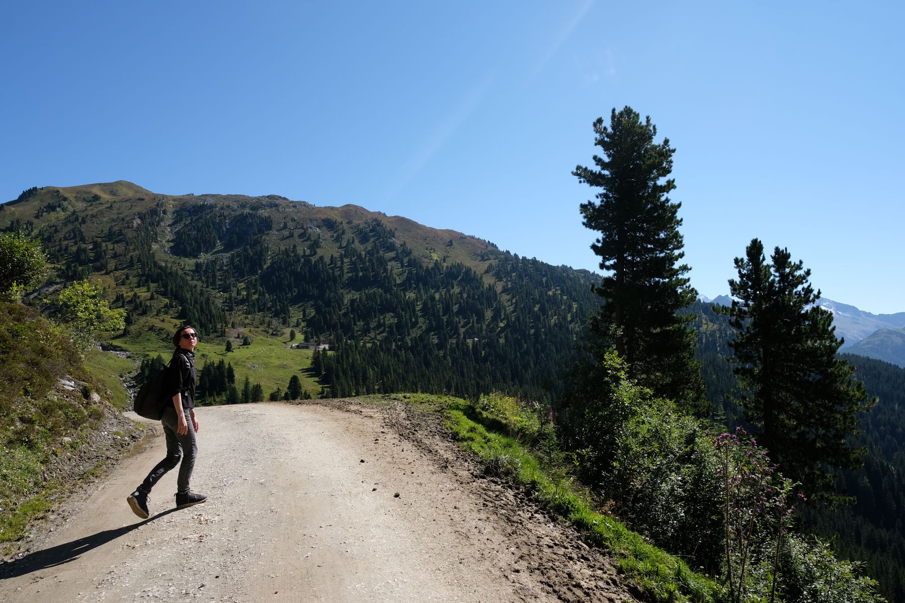 Ira walking up mountain path