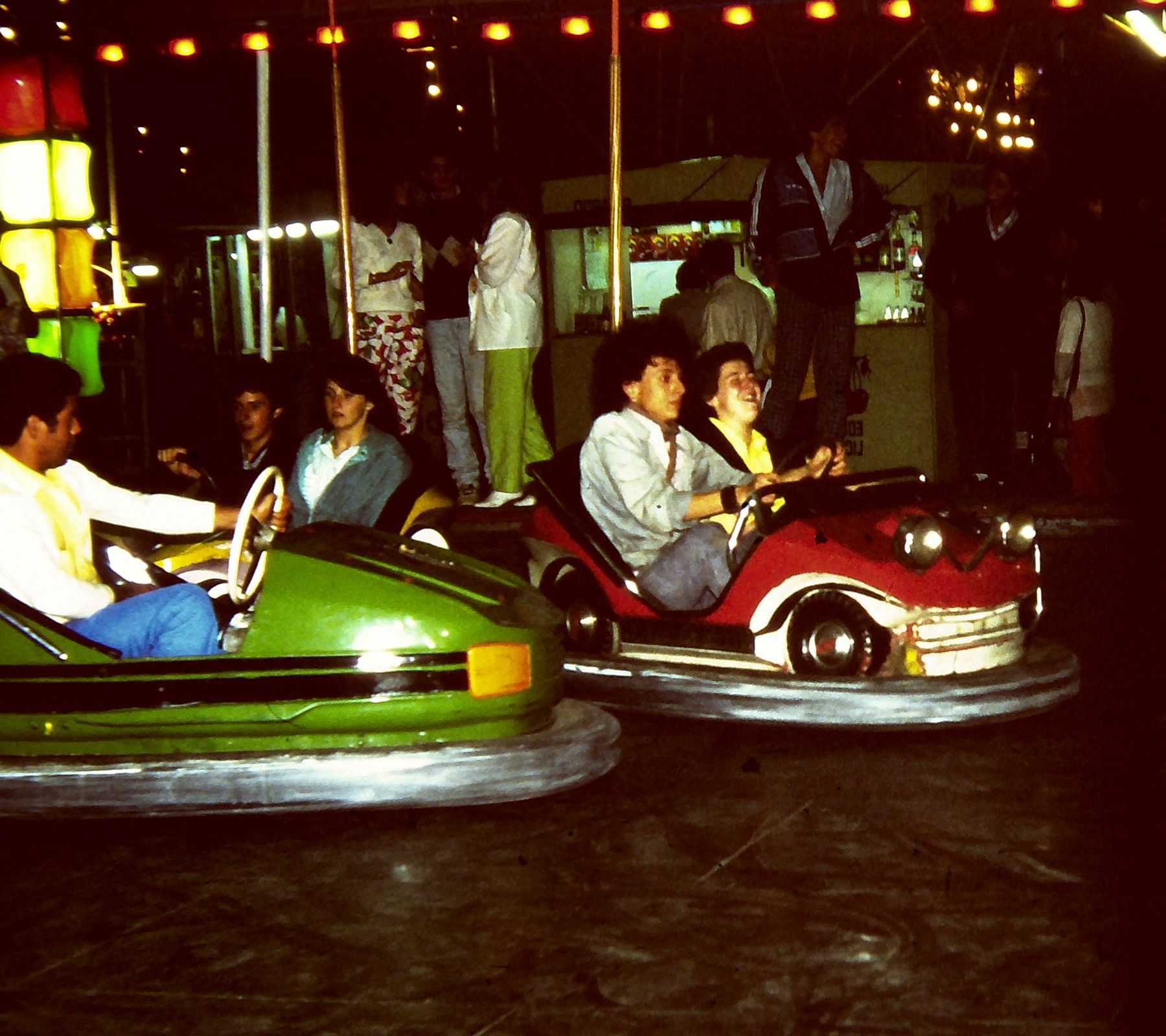 Jeffrey and student in bumper car