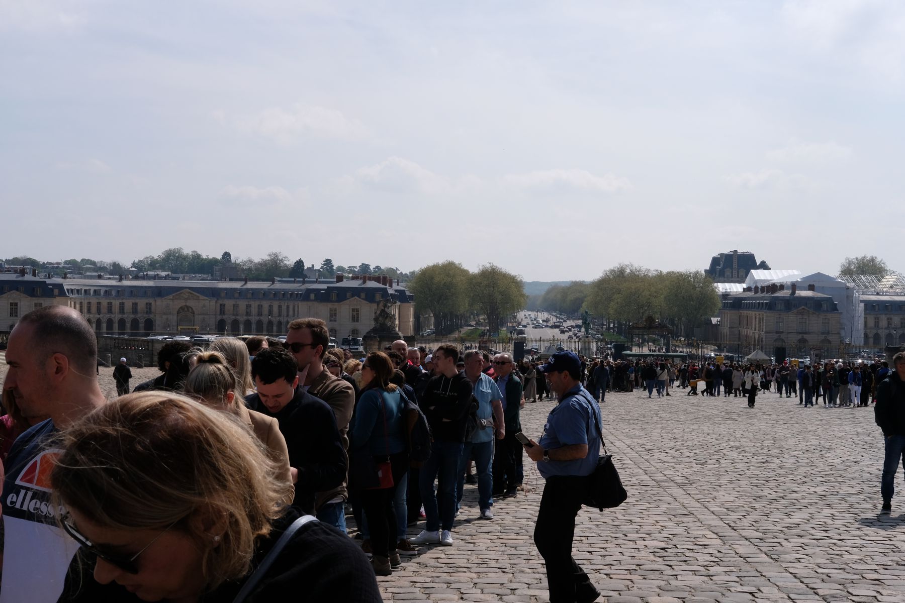 Queue to get into Versaille Palace (with e-ticket).
