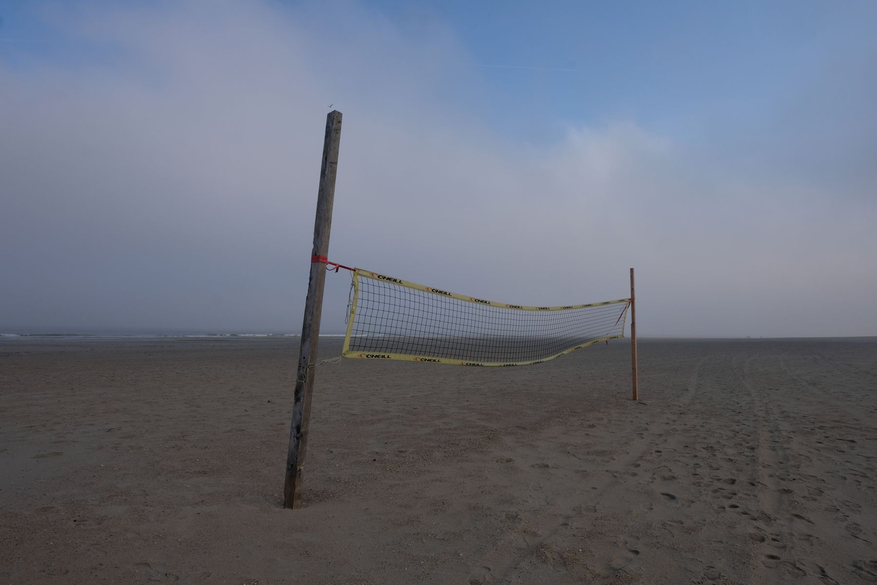 Tennis net on beach